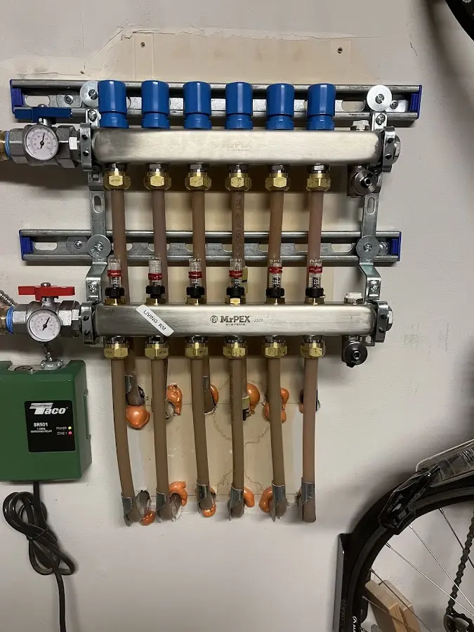 Plumber performing Water Heater Repair at a residential property in Delta